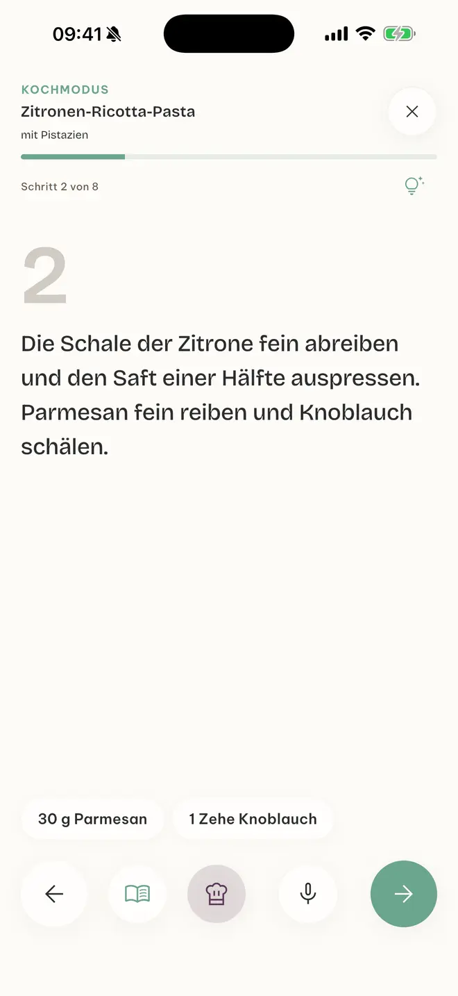 App-Screen Kochmodus, Schritt 2 von 8: Die Schale der Zitrone fein abreiben und den Saft einer Hälfte auspressen
